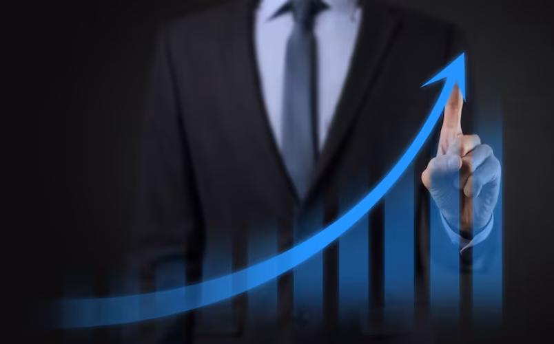 Businessman Pressing Positive Growth Arrow on Black Background